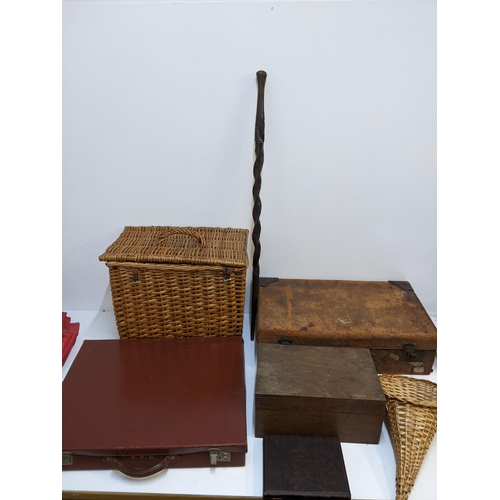 419 - A mixed lot to include a Zimbabwean tribal carved stick, two vintage suitcases, a wicker picnic bask... 