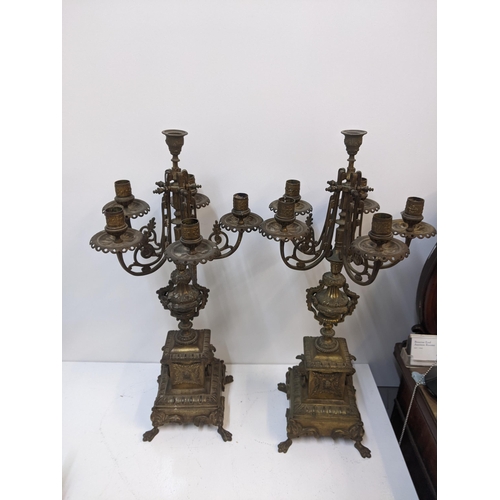 432 - A pair of late 19th century gilt spelter candelabra with lion mask ring handles on paw feet.
Locatio... 