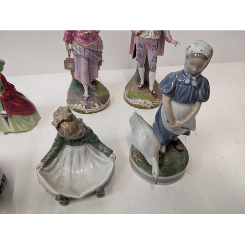 437 - A collection of porcelain figures to include a Royal Doulton figures 'Genevieve', 'Paisley Shawl' al... 