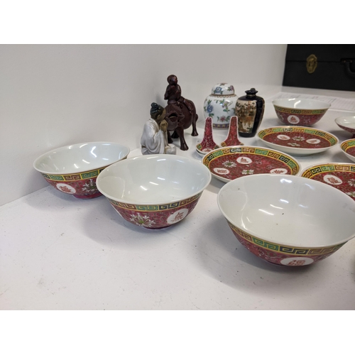 448 - A collection of oriental ceramics to include a Chinese famille rose pattern dinner set along with  a... 