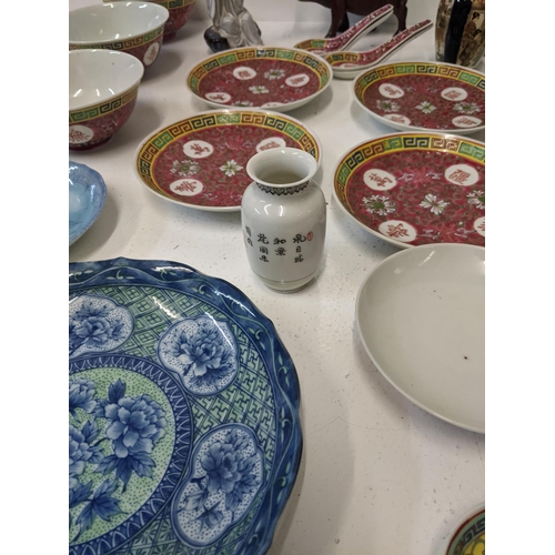 448 - A collection of oriental ceramics to include a Chinese famille rose pattern dinner set along with  a... 