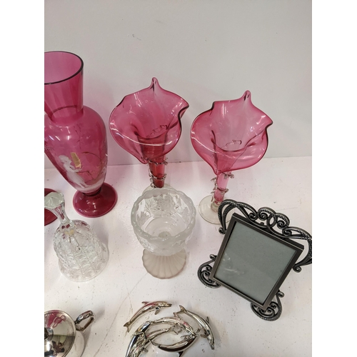 449 - A collection of glassware and metalware to include a pair of continental cranberry glass vases A/F, ... 