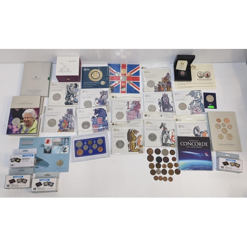 269 - Coins to include eleven sealed £5 coins from The Queen's Beasts Collection, a silver sovereign comme... 