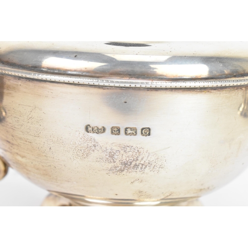 184 - A George V silver tea service, by Marson & Jones, hallmarked Birmingham 1931, the teapot having ebon... 