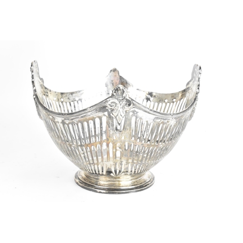 185 - A circa 1900 German 800 silver centre bowl, cast with ribbon motifs above two oval cartouches with p... 