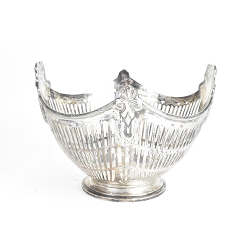 185 - A circa 1900 German 800 silver centre bowl, cast with ribbon motifs above two oval cartouches with p... 