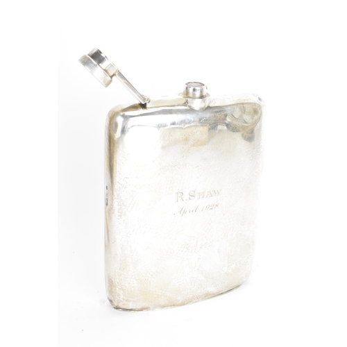 187 - A George V silver hip flask, by Stewart Dawson & Co, hallmarked Chester 1918, of curved form, engrav... 