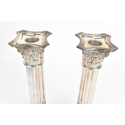 188 - A pair of Elizabeth II silver candlesticks, by Barker Ellis Silver Co, hallmarked Birmingham 1990, i... 