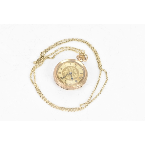 194 - An early 20th century 9ct gold keyless wound ladies fob watch, having a gilt dial with a floral spra... 