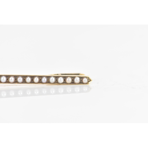 2 - An Edwardian yellow gold and split seed pearl clip with bull nose end, in original Asprey box, 62.1m... 