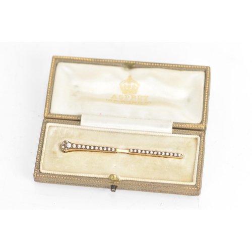 2 - An Edwardian yellow gold and split seed pearl clip with bull nose end, in original Asprey box, 62.1m... 