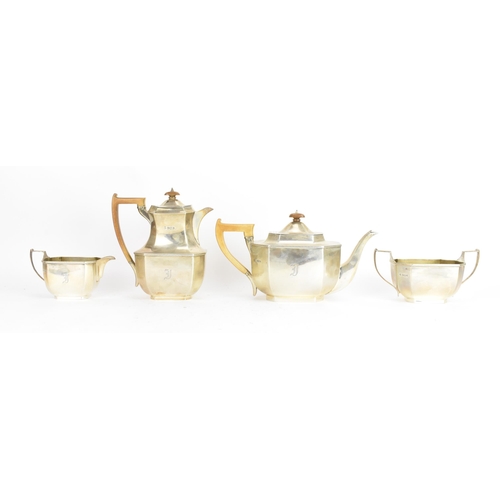 208 - A George V silver four piece tea service, by Thomas Bradbury & Sons Ltd, hallmarked Sheffield 1926 a... 