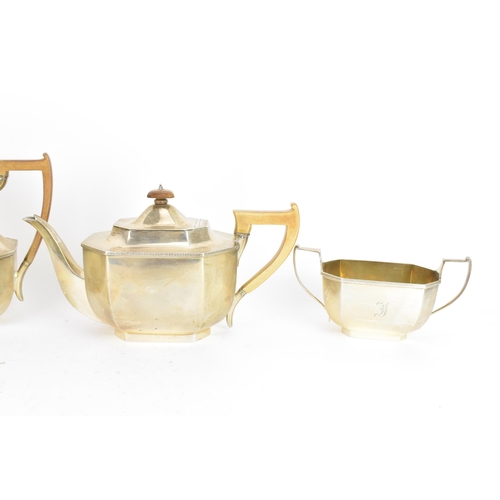 208 - A George V silver four piece tea service, by Thomas Bradbury & Sons Ltd, hallmarked Sheffield 1926 a... 