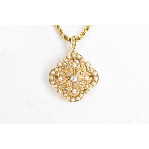 21 - A Victorian diamond and seed pearl 15ct gold pendant and 15ct gold necklace, the pendant fashioned a... 