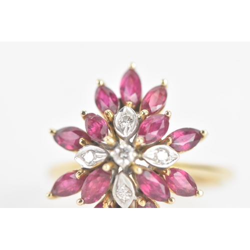 217 - A ruby and diamond 14ct yellow gold cluster dress ring, fashioned as a flower head, with five brilli... 