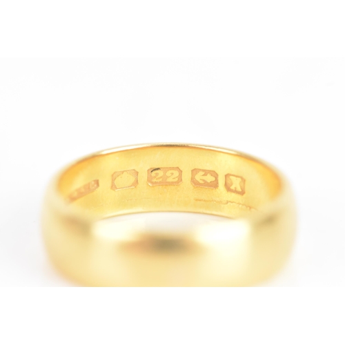 218 - A 22ct yellow gold wedding band, ring size L 1/2, 5.9 grams
If there is no condition report shown, p... 