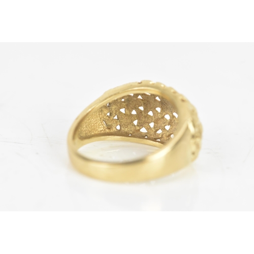 236 - A 9ct yellow gold gents openwork patterned ring, stamped 9ct 375, ring size Q, 4.7 grams
If there is... 