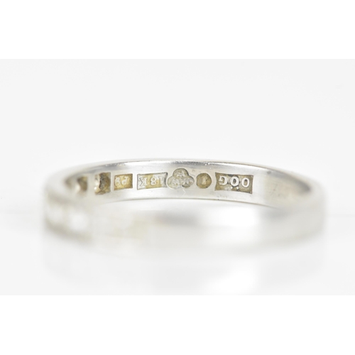 239 - A diamond 18ct white gold half eternity ring, having nine brilliant cut diamonds, each measuring app... 