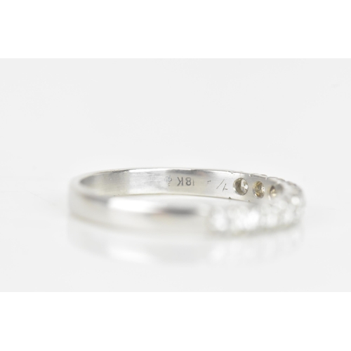 240 - A diamond 18ct white gold half eternity ring, having ten brilliant cut diamonds, each measuring appr... 