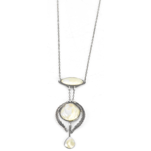 248 - An Arts & Crafts mother of pearl necklace white metal necklace, the pendant with three pearl cabocho... 