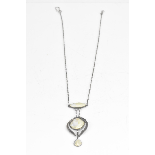 248 - An Arts & Crafts mother of pearl necklace white metal necklace, the pendant with three pearl cabocho... 