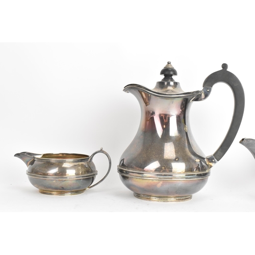 250 - A George VI silver four piece tea service, by Atkin Brothers, hallmarked Sheffield 1937 and 1939, th... 