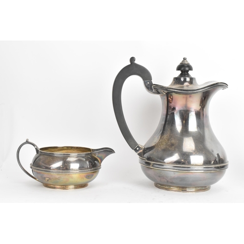 250 - A George VI silver four piece tea service, by Atkin Brothers, hallmarked Sheffield 1937 and 1939, th... 