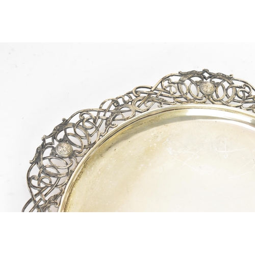 251 - An Elizabeth II silver dish, by Wakely & Wheeler, hallmarked London 1954, having a pierced design ri... 