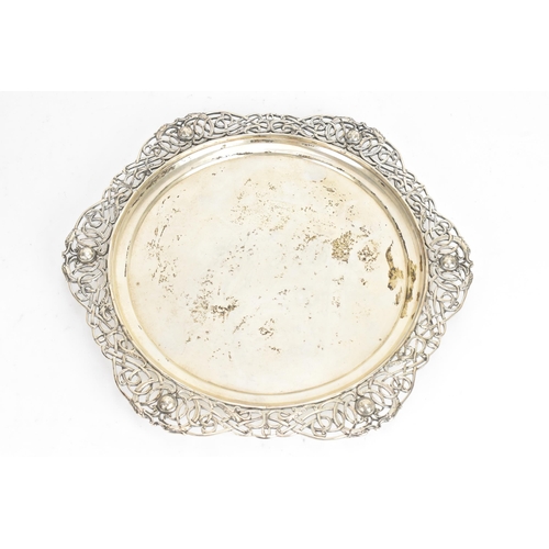 252 - An early 20th century Irish silver dish, makers mark worn, hallmarked Dublin 1912, having a pierced ... 