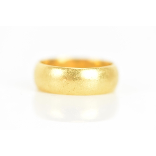 30 - A 22ct gold wedding band, hallmarked London 1967, ring size R, 10.2 grams
If there is no condition r... 