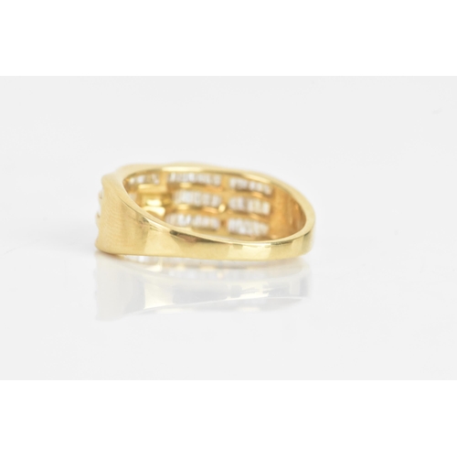 35 - A diamond and 18ct yellow gold ring set, the engagement ring having a brilliant cut diamond, calcula... 