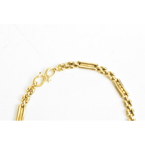 39 - A 22ct yellow gold bar link chain bracelet, having an S-hook clasp stamped 22c KDM, 19.5cm, 11.8 gra... 