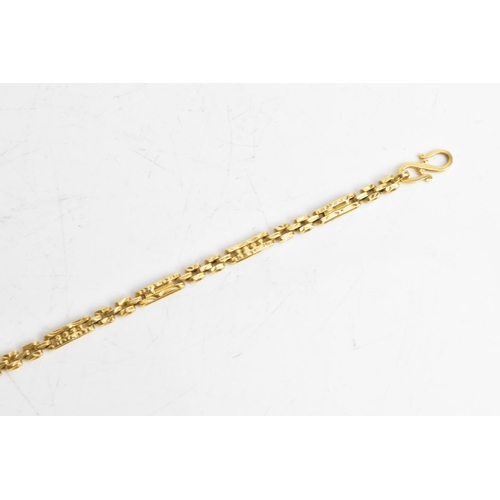 39 - A 22ct yellow gold bar link chain bracelet, having an S-hook clasp stamped 22c KDM, 19.5cm, 11.8 gra... 