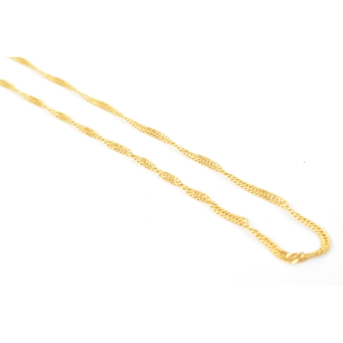 40 - An 18ct gold fine chain Singapore link necklace, having a bolt ring clasp, stamped 750, 60.5cm, 6.9 ... 