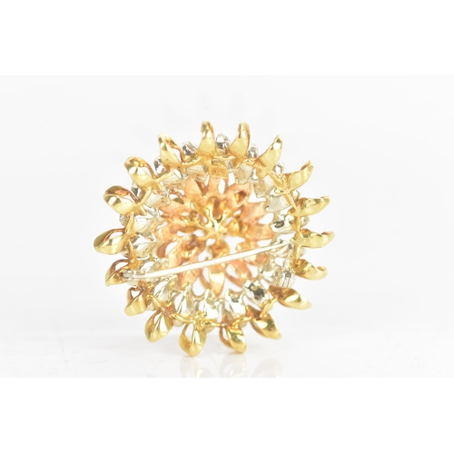 45 - An 18ct tri-coloured gold brooch, fashioned as a flower head, stamped 18K to the reverse, 15.5 grams... 