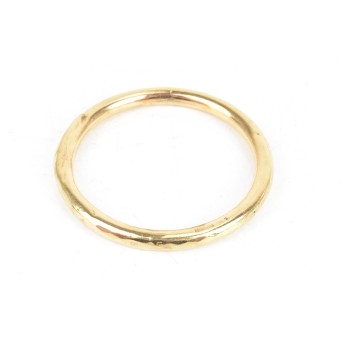 49 - A 1920s 9ct yellow gold bangle, hallmarked Birmingham 1924, makers mark rubbed, 18.6 grams
If there ... 