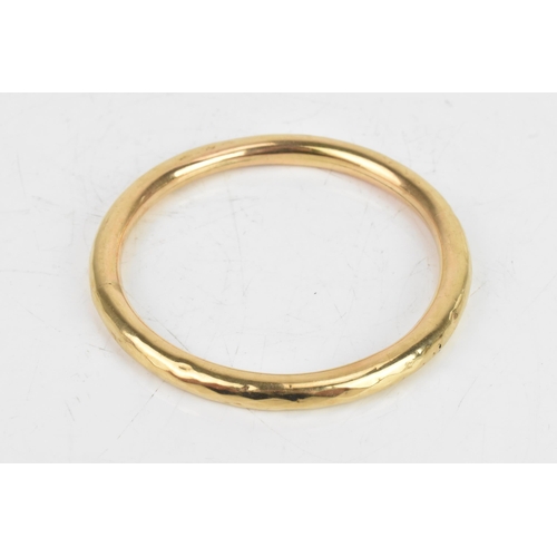 49 - A 1920s 9ct yellow gold bangle, hallmarked Birmingham 1924, makers mark rubbed, 18.6 grams
If there ... 