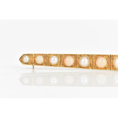 5 - A late Victorian/Edwardian pearl yellow gold bar brooch, inset with thirteen pearls graduating in si... 