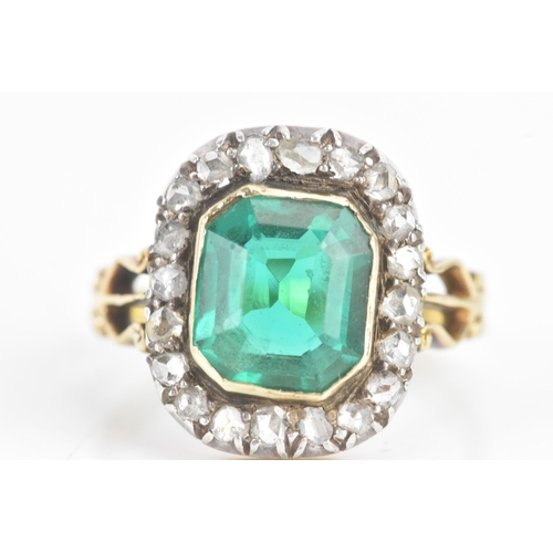 54 - A 19th century green stone and diamond cluster yellow and white metal ring, the central stone 9.4mm ... 