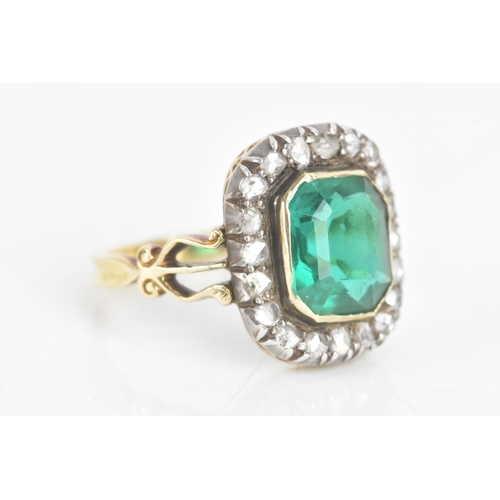 54 - A 19th century green stone and diamond cluster yellow and white metal ring, the central stone 9.4mm ... 