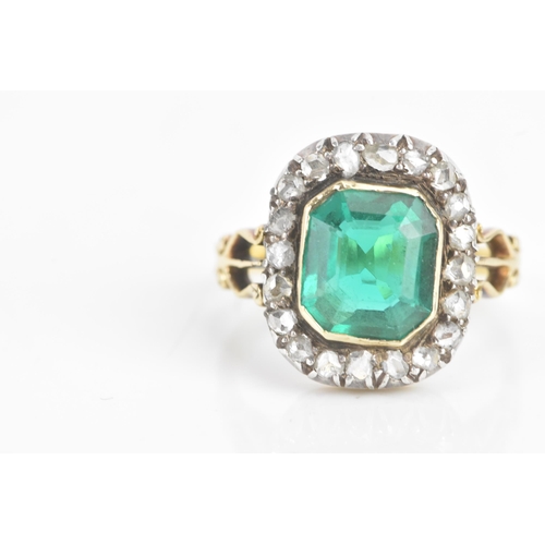 54 - A 19th century green stone and diamond cluster yellow and white metal ring, the central stone 9.4mm ... 