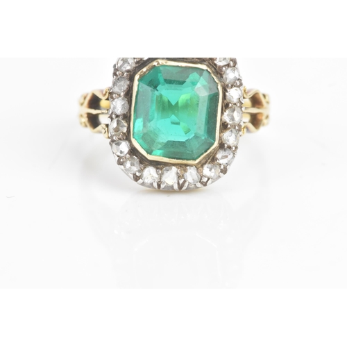 54 - A 19th century green stone and diamond cluster yellow and white metal ring, the central stone 9.4mm ... 