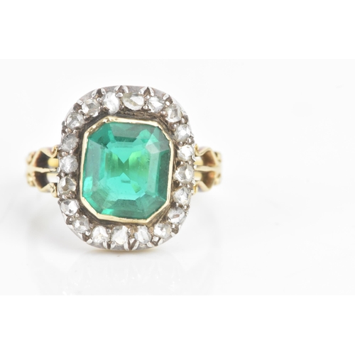 54 - A 19th century green stone and diamond cluster yellow and white metal ring, the central stone 9.4mm ... 