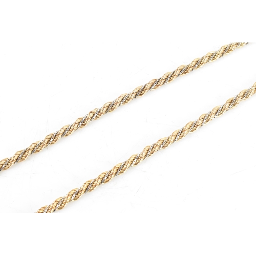 7 - A 9ct gold bi-coloured rope twist necklace, having a bolt ring clasp, stamped 375, 46cm, 16.9 grams
... 