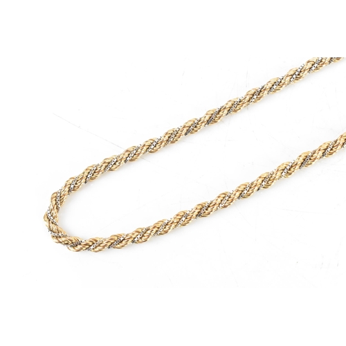 7 - A 9ct gold bi-coloured rope twist necklace, having a bolt ring clasp, stamped 375, 46cm, 16.9 grams
... 