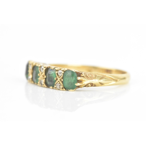 76 - A Victorian emerald and diamond 18ct yellow gold ring, each emerald approximately 3.8mm x 3.1mm, wit... 