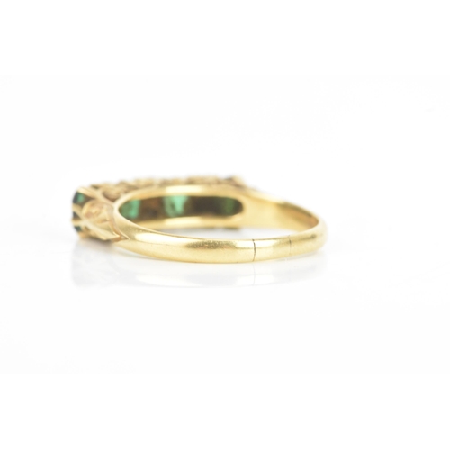 76 - A Victorian emerald and diamond 18ct yellow gold ring, each emerald approximately 3.8mm x 3.1mm, wit... 