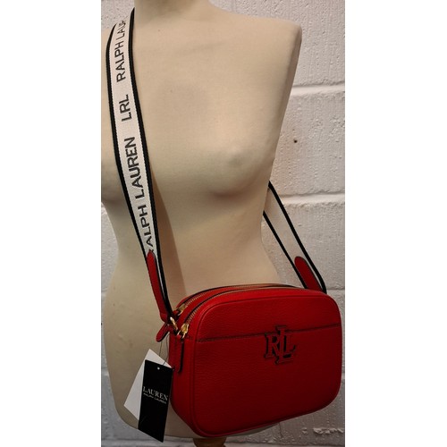 1 - Ralph Lauren- A new red leather crossover bag having original tags with branded canvas shoulder stra... 