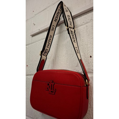 1 - Ralph Lauren- A new red leather crossover bag having original tags with branded canvas shoulder stra... 