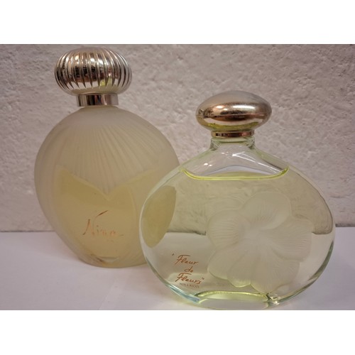 23 - Nina Ricci- 2 display perfume bottle factices, one Lalique Fleur de Fleur bottle, approx 14cm high, ... 